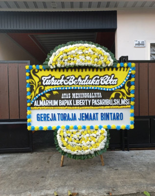 Papan Bunga Duka di Kencana